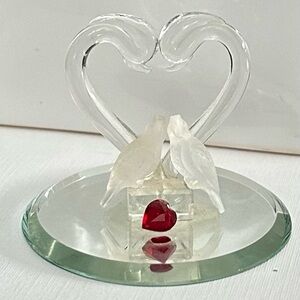 Vintage glass swan figurine with red heart accent